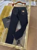 2024 Весенняя осенняя вышиваемая печать печати на молнии мужские джинсы сорванные световые брюки