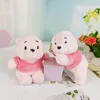 Posture assise parfumée en peluche en peluche