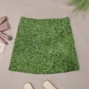Jupes astroturf luxuriante Turf Grass Athletic Field Texture Mini jupe élégante pour la tenue de club de nuit féminine pour femmes