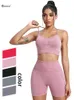 Les survêtements féminins chreisure se couvrent les sports sans couture pour femmes 2pcs yoga ensemble soutien-gorge de fitness avec shorts de vélo de gymnase