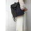 Ryggsäck stil kvinnors modemärke lysande kvinnlig student viker dragskolväska holografisk geometrisk ryggsäck