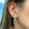 Boucles d'oreilles étalon 2024 Aspect arc oreille à oreille or argent couleur zircone ruban de soie pour femmes bijoux de mode filles