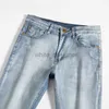 Jeans de designer pour hommes printemps d'été mince luxe luxe en relief décontracté polyvalent slim slim small raide tube de denim masculin long pantalon