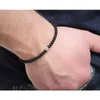 Bärade enkla och fashionabla svarta pärlarmband lämpliga för pojkar justerbart elastiskt rep handgjorda naturliga stenar ultratunna smycken