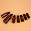 Bouteilles de rangement 1 pcs 5 ml-30 ml bouteille d'huile essentielle en verre ambre avec capuchon de trou pour compritement d'échantillon de parfum