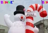 Célébrez les fêtes géantes de Noël gonflable de Noël, le bonhomme de neige à la tête de neige givrée éclairée pour la décoration publicitaire événements en plein air