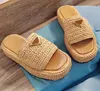 Designer Slippers P family thick soled woven flip flops new summer grass woven sponge cake sole sandals for women to wear externally