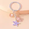 Keychains Lanyards süße Schlüsselanhänger Emaille Sommer Beach Seestarfish Muschel Anhänger für Frauen Männer Auto Schlüssel Handtasche Anhänger Schlüsselketten DIY -Geschenke