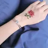 Tatuaggio trasferimento fiore lotus maniche tatuaggi da donna maniche braccia da polso tatuaggi temporanei tatuaggi impermeabili di tatuaggi temporanei 240426