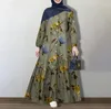 Vestidos informales de algodón musulmán y lino Botón redondo de cuello redondo Burbuja Burbuja de goma de manga larga Vestido de moda para mujeres sueltas de moda