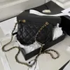 Sac fourre-tout haute définition Xiaoxiangjia boucle magnétique fin classique ringge ringge double chaîne simple oblique croix caviar femme