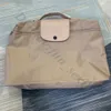 Pliage de magasin bon marché 90% de réduction sur le sac de gros anniversaire anniversaire brodé en nylon.