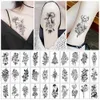 Trasferimento di tatuaggi 30pcs/set di adesivi da tatuaggio temporanea Donne impermeabili rosa nera tatuaggio finto corpo da tatuaggio gambe gamba fiore tatouage temporaire femme 240426