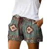 Kvinnors shorts trend kvinnliga shorts elastiska midjeband svett absorption sak retro tryck utdragande lösa shorts y240425