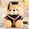 En gros des vêtements de baccalauréat à ours doctorants mignons, des poupées d'ours en peluche, des cadeaux de remise des diplômes, des partenaires de jeu pour enfants, des décorations de maison