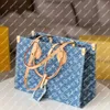 Explosion Heiße Frauenbeutel Einkaufstasche M46871 mm Handtaschen Denim Canvas Cowhide Ledergrad Griffe Reittiere große Form großer blauer Rucktasche Goldene Handtasche Einkauf neu