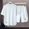 Heren Tweede stuk set Summer Fashion Korte mouwen T-shirt en shorts Losse Koreaanse sets Men Designer Designer Tracksuits 240415