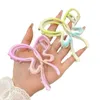 Klemmen 1PC Women Metall Gradientenfarbe unregelmäßiger Hohlausleitungsbogen -Ribbon -Haarclip für Mädchen Prinzessin Kopfschmuck Haar Accessoires Y240425