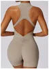 Women's Tracksuits Back V jumpsuit womens gym set yoga training set sportswear integrated sports jumpsuit fitness jumpsuit elastic fitness suit 240424