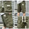 Heren shorts 2024 Zomer Amerikaanse gereedschapshorts Heren Mens Multi-Pocket Quick Drying Shorts Ademende rechte vijfpunts broek Streetwear D240426