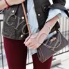 Sacs à bandoulières vendant des conceptions de luxe classiques pour dames sacs à main de sac à main femme de qualité de bandoulière authentique cuir eva embrayage