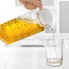 Water Bottles 2 Pack Plastic Pitcher With Lid 1.1L Jar Ribbed Design BPA-Free Clear