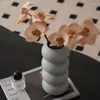 Vaser staplade cirkulära keramiska vaslyktaformade vardagsrum blommor arrangemang enhet