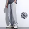 Pantalon pour hommes Mesh de poche ample adaptée à un pantalon de jogging à nage inférieur consécutif