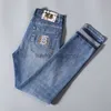 Designer Jeans Herren Frühling/Sommer Neue Modemarke Stickte Jeans Herren schlanker fit elastischer kleiner Fuß langer Hosen 985