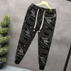 2024 Men's clothing New Pi Shuai Printed Trendy jog Brand Spring/summer Tie Feet for Youth Autumn mens joggers pants