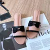Designer glissades sandales de luxe pour femmes mules plates de la Fashion Week Slippers Camellia Slider Bowtie Not Calfskin Leather Ladies Summer Beach Shoe Casual Shoe Blanc