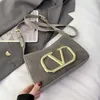 Bolsa de diseñador exquisito bolso de mujer bolso elegante Bolsa de axilas de arena de cuero para mujer bolsas pequeñas