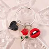 Клавичные кормеры мода мода роза цветочный цветок эмамел Любовь Сердце красные губы Ключевые цепи сувенир подарок для женщин мужские сумочка Ключе