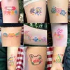 Tattoo -overdracht 30 stc/lot cartoon kleine tattoo stickers set vrouwelijke kinderen waterdichte schattige beer konijn kunst nep tattoo arm sleutelbeen tattoo tool 240427