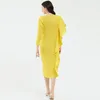 春の女性エレガントなハイセンスニッチドレスデザイン非対称のソリッドカラーステッチスカート