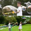 Piaska gra woda zabawy bąbelkowe są tworzone do gigantycznych bąbelków letnich zabawek na zewnątrz interaktywne dzieci dzieci Q240426