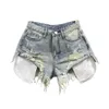 Kvinnors shorts koreanska vintage blå sexig rippade jeans för kvinnor lapptäcke a-line hög midja denim ultra shorts y240425