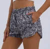 Hotty Hot High Rise Shorts Женщины дышащие быстрые сухой йога тренажерный зал шорт -шорты на молнии в карманах грузовые брюки с непрерывными пряными брюками с непрерывными притяжениями.