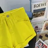 Dames shorts Koreaanse denim shorts 2024 Nieuwe zomer slanke shorts jeans dames a-line hot pants geel y240425