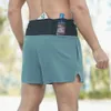 Pantalones cortos deportivos para hombres cortos de dos piezas de dos piezas Fitness Shorts a través de pantalones de tres cuartos de secado de tres cuartos D240426