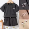 Clothing Sets New Summer ldren 2pcs Sets Boys Girls Short Sleeve Rugby/Daisy Embroidery T-shirt+Solid Shorts 2pcs Set Kids Leisure Suits H240429
