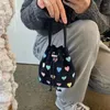 Drawstring niche geborduurde liefde handheld canvas tas 2024 lente en zomer one-shoulder cross-body mini-emmer wandelen