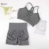 Les survêtements féminins chreisure se couvrent les sports sans couture pour femmes 2pcs yoga ensemble soutien-gorge de fitness avec shorts de vélo de gymnase