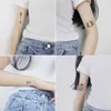 Transfert de tatouage 30 feuilles imperméables noires minuscules tatouages plumes femmes corps art de la main de la main de dessin temporaire tatouage des hommes de doigt