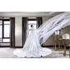 Suknie z koralikami Pearls Wedding Dubai Długie wysokie rękawy Białe satynowe sukienki ślubne Odłączany pociąg