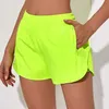 Hotty Hot High Rise Shorts Женщины дышащие быстрые сухой йога тренажерный зал шорт -шорты на молнии в карманах грузовые брюки с непрерывными пряными брюками с непрерывными притяжениями.