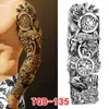 Transfert de tatouage Autocollant de tatouage pour hommes femmes Tribal totem Tatoue complet Tatouage faux tatouage temporaire Skull Skull Tatoo temporari étanche 240426