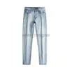 Jeans de designer pour hommes printemps d'été mince luxe luxe en relief décontracté polyvalent slim slim small raide tube de denim masculin long pantalon