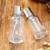 Speicherflaschen 30 ml 50 ml 100 ml Parfüm Crimp Pump glänzende Silberdeckel Kosmetische Verpackung leer klare Glasspray nachfüllbare Flasche 8pcs