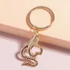 Keychains lanyards schattige slangen sleutelhangers voor autosleutel legering dier charmes sleutels vrouwen mannen handtas hangers sleutelhangers ketens diy sieraden accessoires